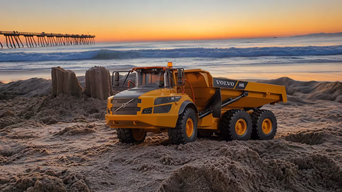 1:14 scale JVBTVB G308H RC excavator scooping at the mobile dig pit