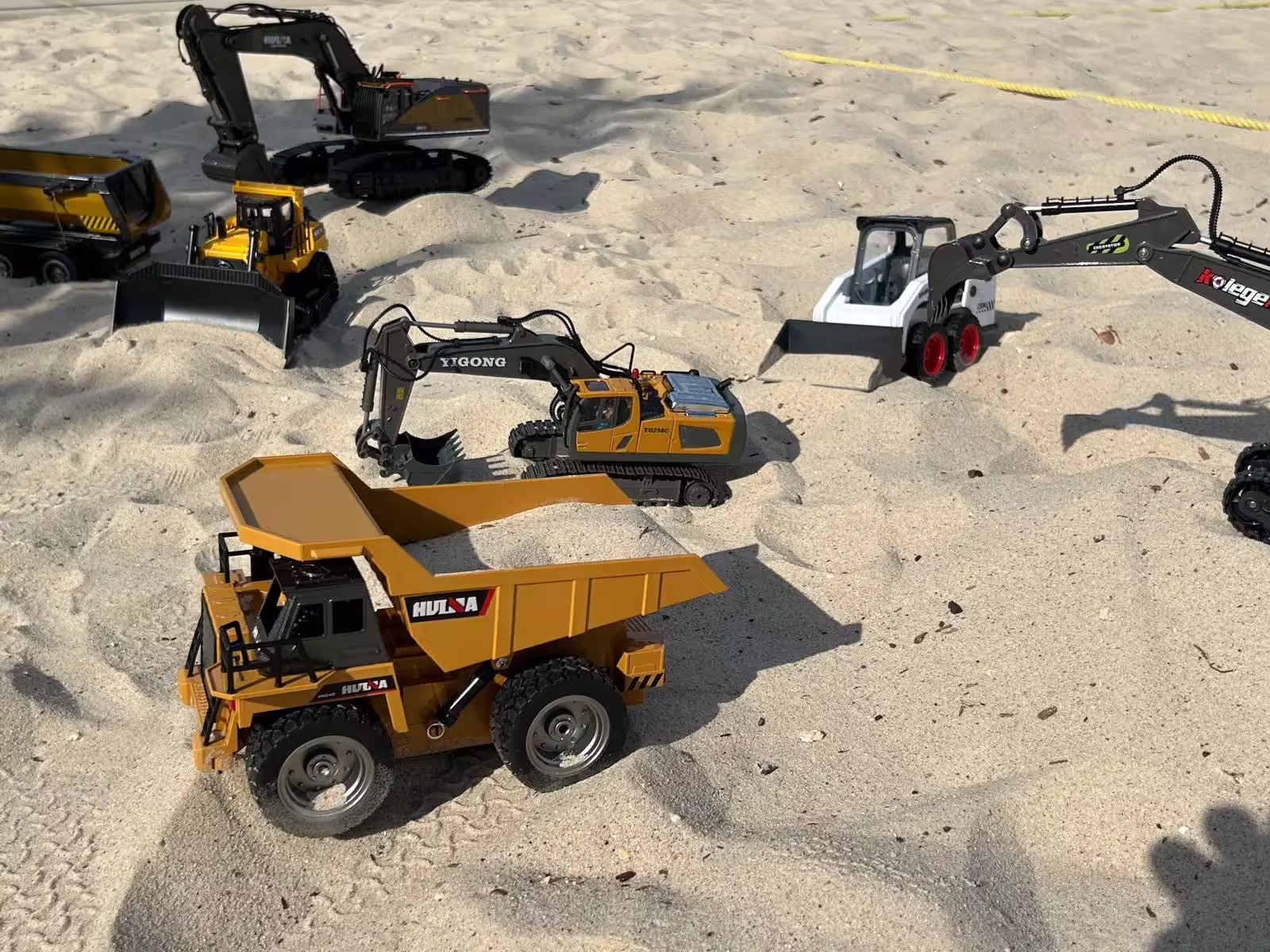 RC excavator operating at the mobile dig pit
