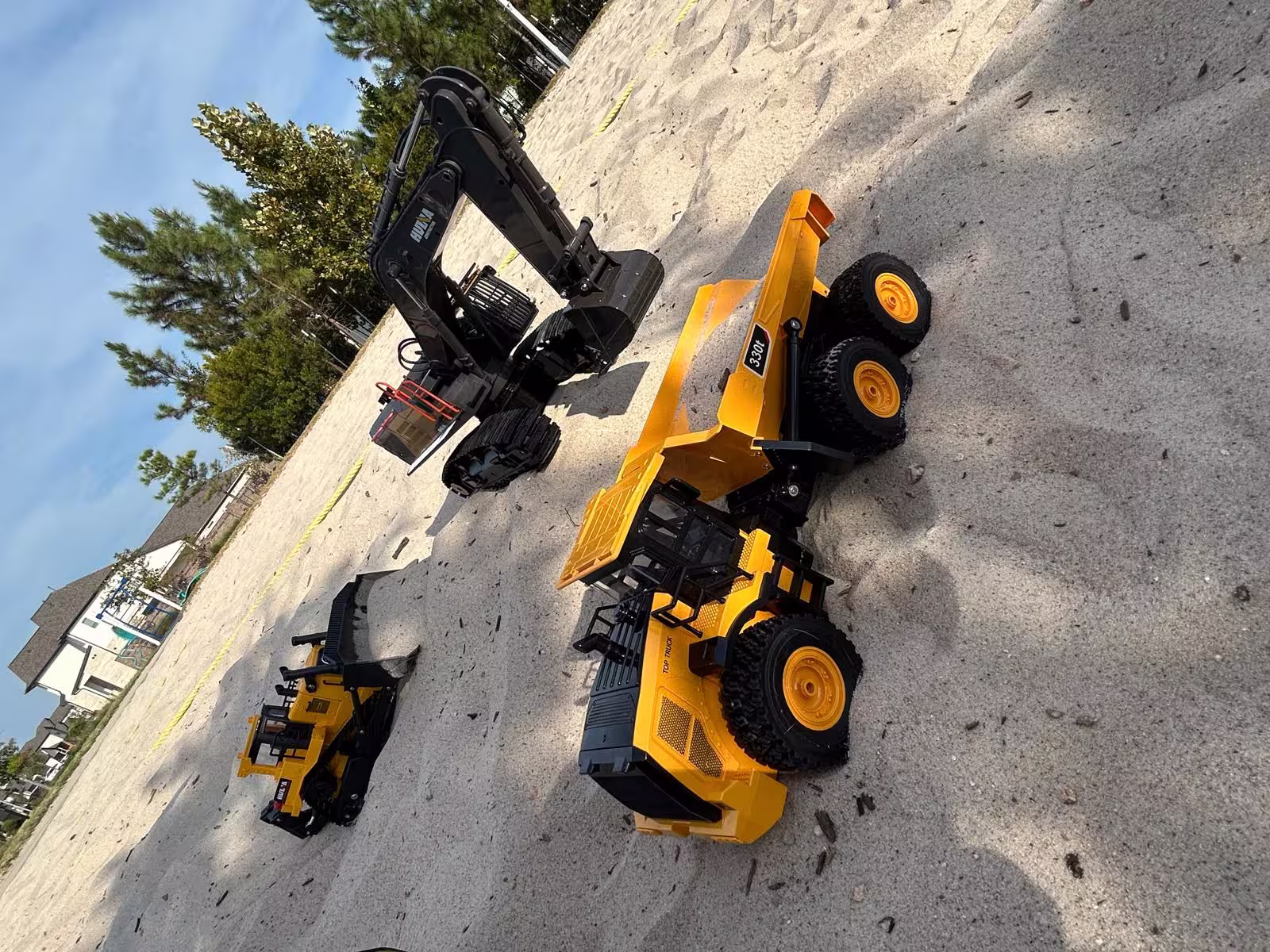 RC bulldozer grading terrain